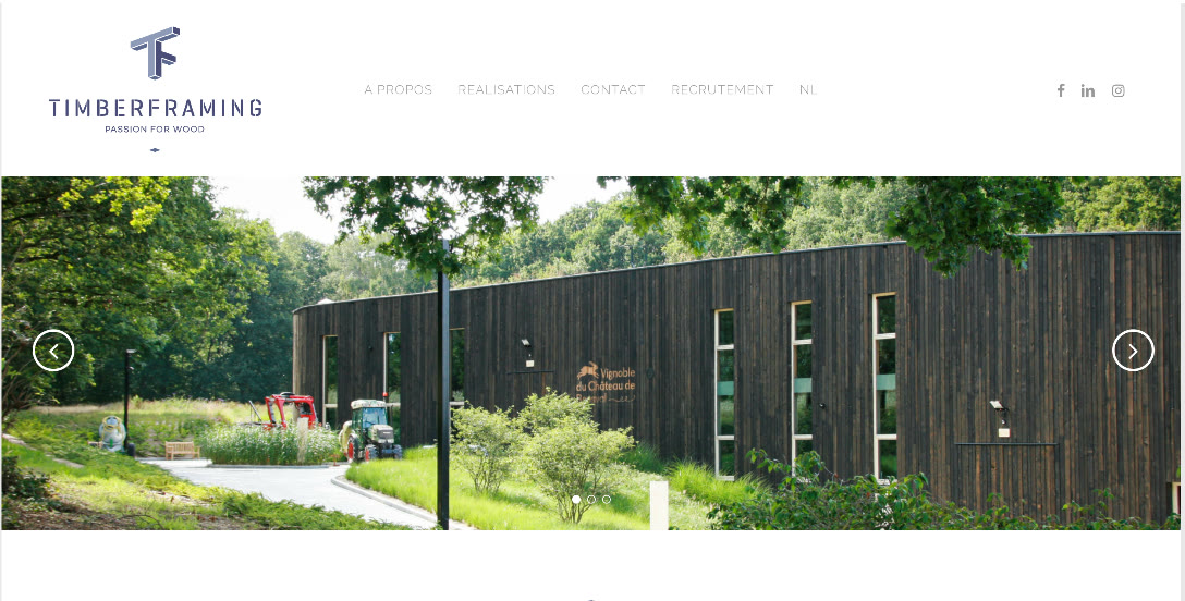 Ancien site Timberframing : logo, menu et carrousel de photos, slogan « Passion for wood ».